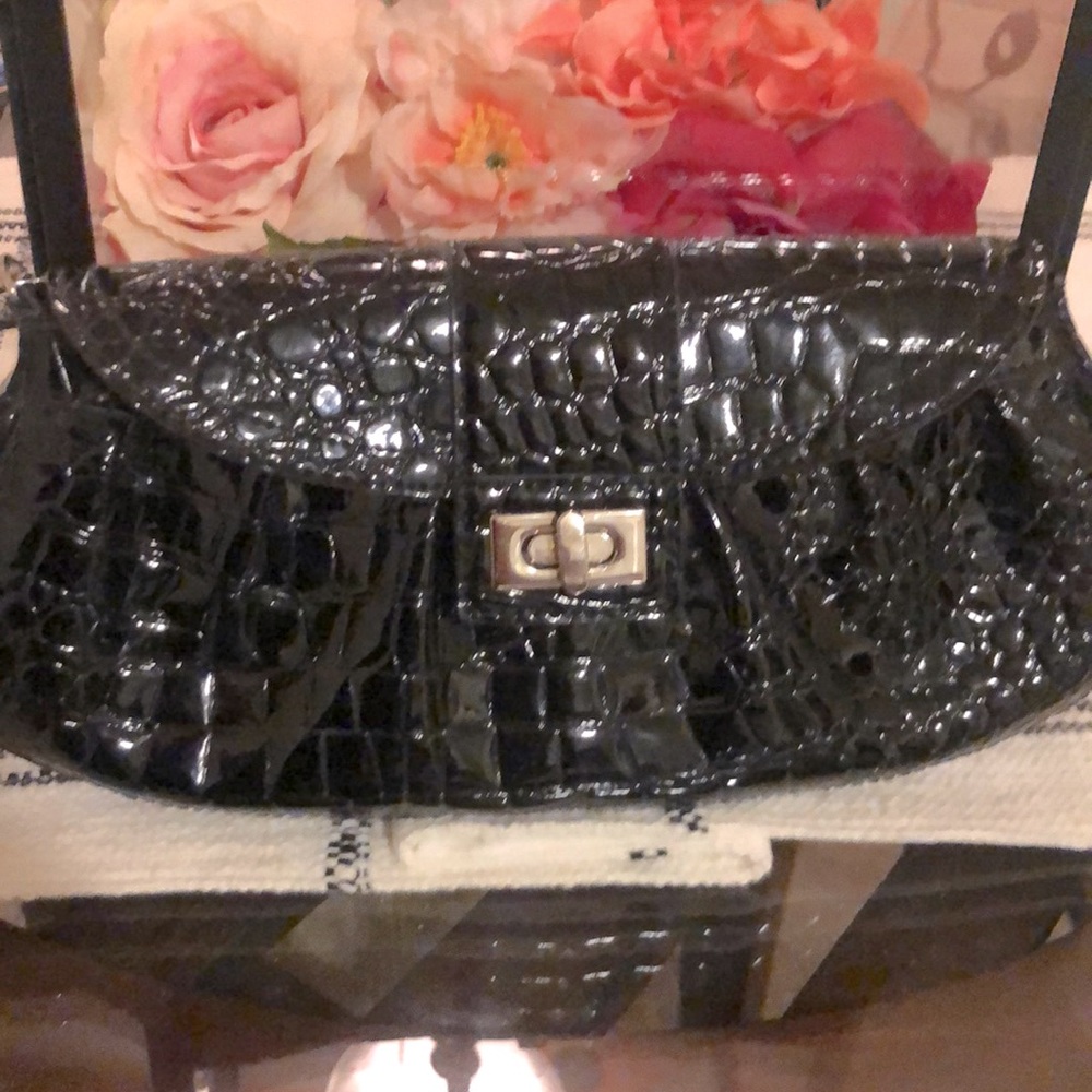 Evening clutch with wristlet holder.
